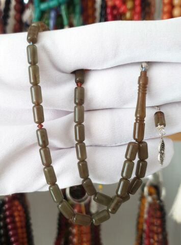 KAPSÜL MODEL PETROL  YEŞİLLİ SIKMA KEHRİBAR / GÜMÜŞ PÜSKÜLLÜ