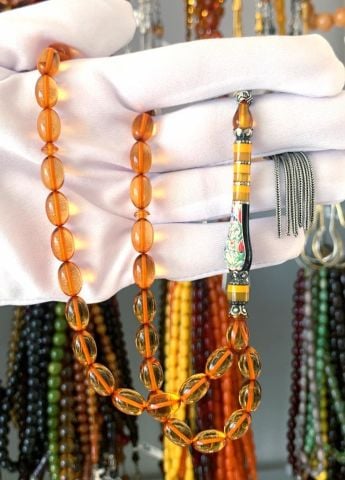 ATEŞ KEHRİBAR TURUNCU  RESİM İMAMELİ GÜMÜŞ PÜSKÜLLÜ TESBİH