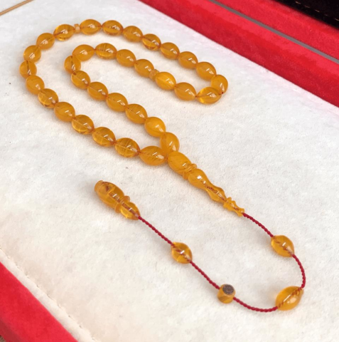 KIRMIZI BEYAZ HARELİ SIKMA KEHRİBAR TESBİH Sarı