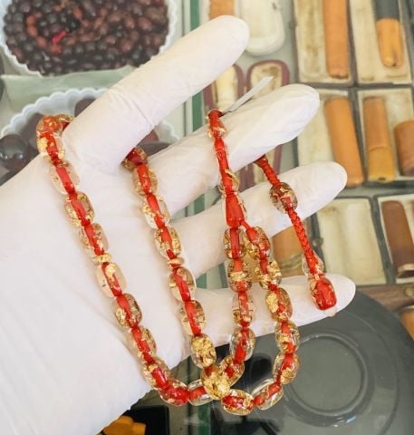 ALTIN PARÇACIKLI ÖZEL DÖKÜM KIRMIZI ŞEFFAF KATALİN TESBİH