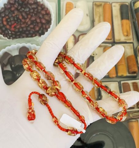 ALTIN PARÇACIKLI ÖZEL DÖKÜM KIRMIZI ŞEFFAF KATALİN TESBİH