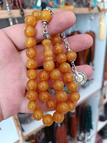 ÇUBUK MALZEMEDEN SIKMA KEHRİBAR KÜRE MODEL 10.5*10 HARELİ DİK DAMAR